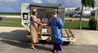 Hon. Tiffany Babington at Fua&#039;amotu Airport, with the new shipment of vaccines. 16 June 2021.