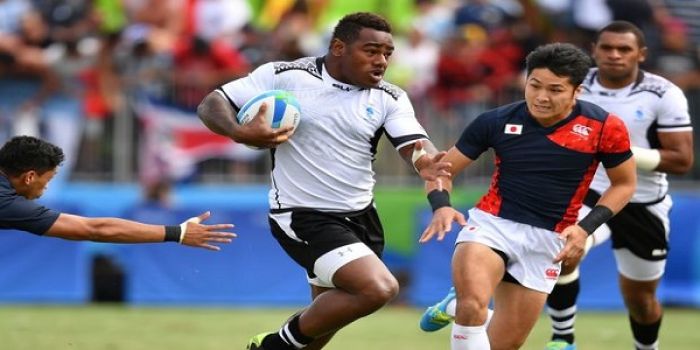 Fiji&#039;s Josua Tuisova runs with the ball against Japan