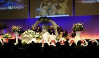 Family of Sione Lauaki, including wife Stephanie (second left), say their farewells. Photo: RNZ / Laura Tupou