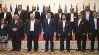 Prime Minister Shinzo Abe and other leaders pose for a group photograph at the PALM 8 Meeting in Iwaki, Fukushima Prefecture, on May 19. | KYODO