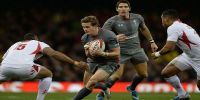 Hallam Amos of Wales takes on Vunga Lilo of Tonga. (2013)Wales and Tonga could end up playing in Auckland, New Zealand. The last time they faced off was in Cardiff, 2013 where the Welsh won 17 -7.  Photo: Photosport