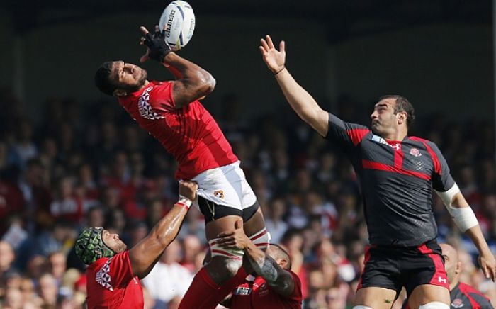 Tonga's Steve Mafi, left, in action with Georgia's Mamuka Gorgodze (Photo: Al)