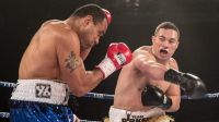 Joseph Parker, right, throws a right hook at Solomon Haumono during their heavyweight bout at Horncastle Are