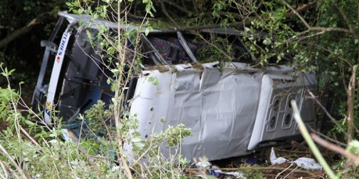 The bus carrying 53 staff and students from Tonga crashed through a road barrier and down a bank on State Highway 2