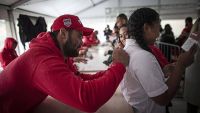 Andrew Fifita signing autograph