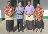 Commissioner Cardwell with Members of the 14th Contingent 