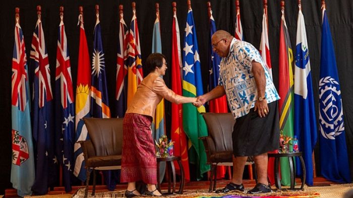 ILO Assistant Director-General and Regional Director for Asia and the Pacific Chihoko Asada-Miyakawa greets Fiji President Wiliame Katonivere.