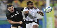 Olympics.New Zealand&#039;s Sam Dickson, left, tackles Fiji&#039;s Vatemo Ravouvou. Photo: AFP