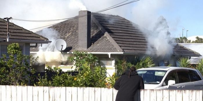 Emergency services attend to a house fire at a property on Preston Road in East Tamaki. Photo / NZ Herald