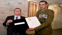Lieutenant Colonel Bill Keelan the outgoing New Zealand Defence Forces Attache to Tonga has been presented with the Australian Defence Force’s Commendation for Distinguished Service at the Australian High Commission in Wellington.