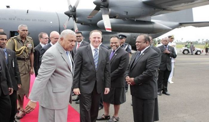 New Zealand's prime minister John Key and Fiji's prime minister Frank Bainimarama on Mr Key's arrival in Suva on Thursday 9 June 2016. Photo by Fijian government