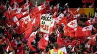Tongan fans celebrate their team&#039;s win over Great Britain in Hamilton Photo: Photosport