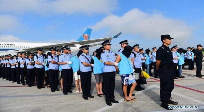 The 77 suspects, shown here in pictures released by China&#039;s Xinhua news agency, were paraded when they landed in Changchun, in China&#039;s northeast. Photo: Xinhua