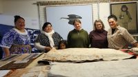 Led by head conservator Carolina Izzo, 2nd right, the studio is dedicated to maintaining taonga - cultural treasures